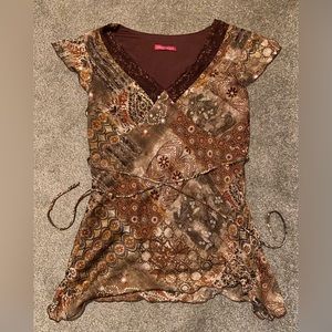 Size (L) bunch of patterns and the colors are dark orange dark brown and beige